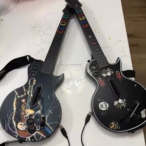 Sony Black Guitar Controllers for Video Games
